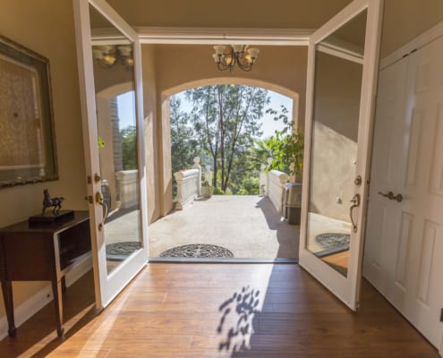 A wide open front entrance door