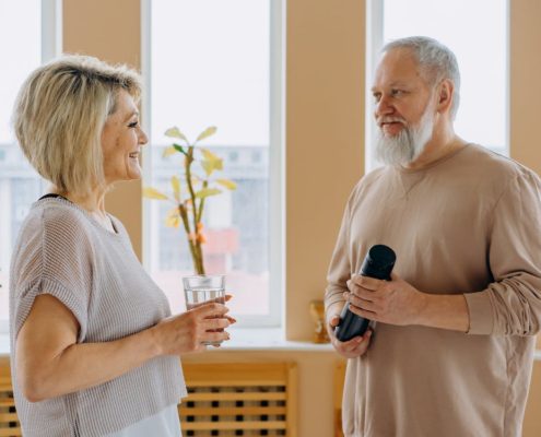 a happy older couple aging in place