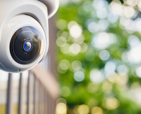 An outdoor home security camera on a sunny day