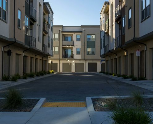driveway leading to row housing condominium driveways